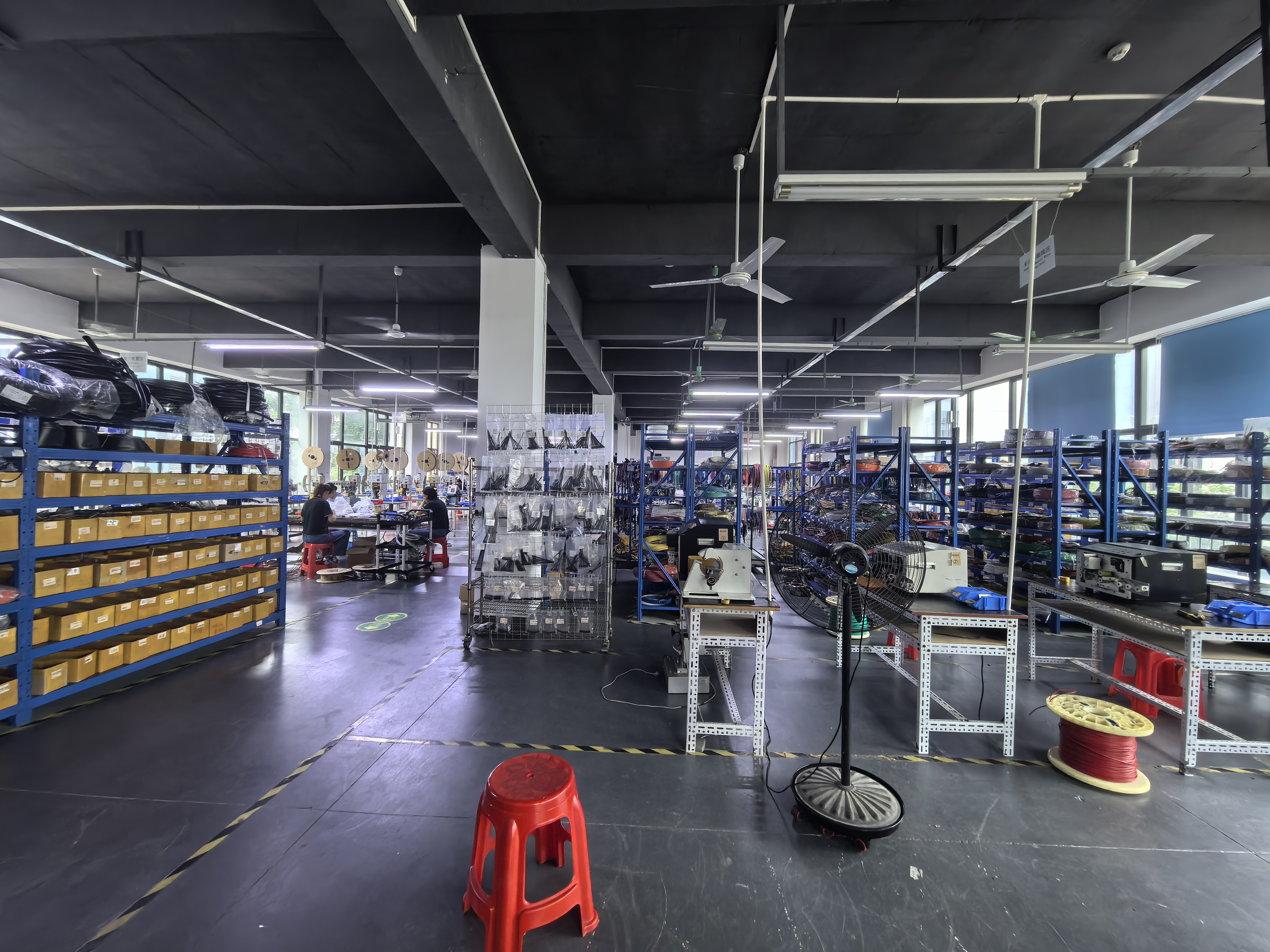 ECS System Parts Manufacturing Workshop - Production Floor with Workers and Equipment